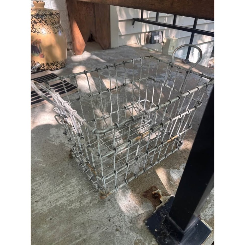 Farmhouse primitive wire basket . Great to hold cookbooks . Very heavy w handles